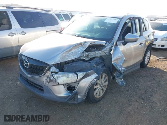 2014 Mazda CX-5 Sport with VIN JM3KE2BE9E0330345, listed as a IAAI auction lot 41377335 with 103,340 mi miles and . Bid and sale history available at carsss.com. Image 17.