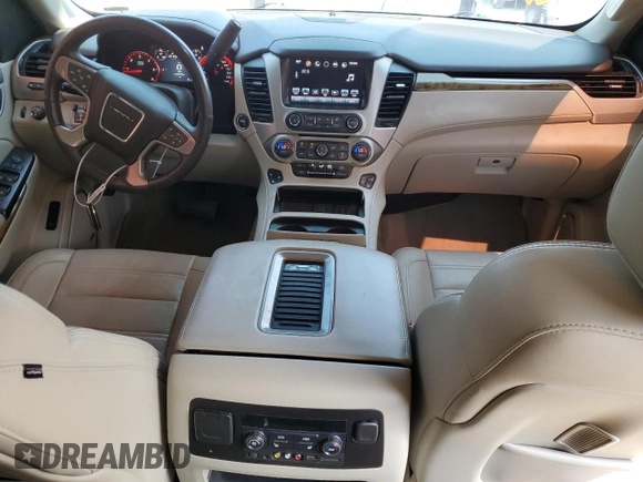 2016 GMC Yukon Denali with VIN 1GKS1CKJ3GR403865, listed as a Copart auction lot 68534264 with 129,655 mi miles and Salvage Title. Bid and sale history available at carsss.com. Image 8.