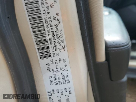 2015 Jeep Cherokee Sport z VIN 1C4PJLAB9FW547402, wystawiony jako Copart lot #53164885 z przebiegiem 128 717 mil mil oraz Szkoda całkowita • Salvage title. Historia ofert i sprzedaży dostępna na DreamBid. Obrazek 13.