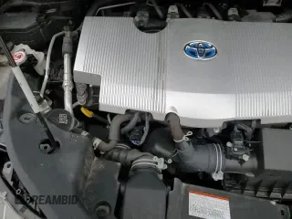 2021 Toyota Prius L Eco with VIN JTDKAMFU2M3149733, listed as a Copart auction lot 50196935 with 97,975 mi miles and Salvage title. Bid and sale history available at DreamBid. Image 13.
