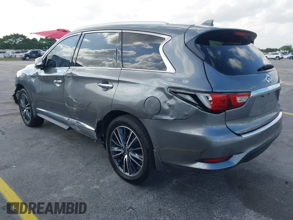2016 Infiniti QX60 with VIN 5N1AL0MM1GC510760, listed as a IAAI auction lot 41990248 with 60,296 mi miles and . Bid and sale history available at DreamBid. Image 3.