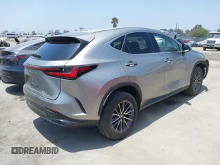 2022 Lexus NX 350 Premium z VIN 2T2GGCEZ1NC008202, wystawiony jako IAAI lot #42438898 z przebiegiem 14 729 mil mil oraz . Historia ofert i sprzedaży dostępna na DreamBid. Obrazek 4.