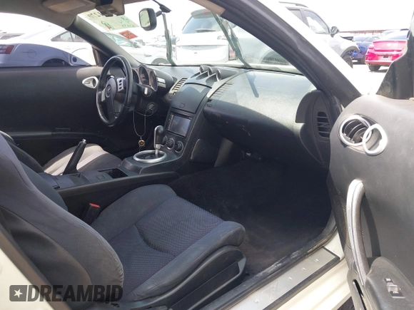 2004 Nissan 350Z Touring with VIN JN1AZ34D14M102966, listed as a IAAI auction lot 41921270 with 182,633 mi miles. Bid and sale history available at carsss.com. Image 5.