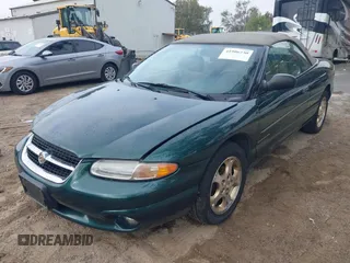 1998 Chrysler Sebring JXi with VIN 3C3EL55H6WT232076, listed as a IAAI auction lot 41906230 with 54,718 mi miles and . Bid and sale history available at DreamBid. Image 2.