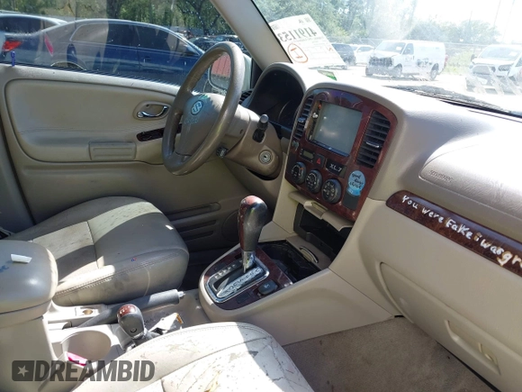 2003 Suzuki XL-7 Touring with VIN JS3TX92V934104149, listed as a IAAI auction lot 41911536 with 140,199 mi miles. Bid and sale history available at carsss.com. Image 5.