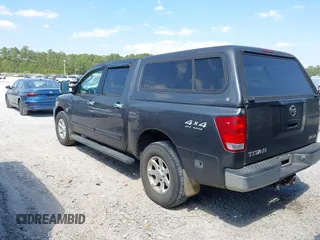 2004 Nissan Titan LE with VIN 1N6AA07B04N546666, listed as a IAAI auction lot 42045671 with 280,796 mi miles. Bid and sale history available at carsss.com. Image 3.