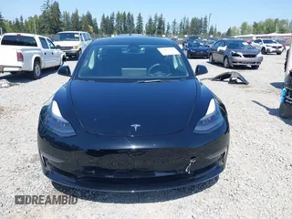 2022 Tesla Model 3 Long Range with VIN 5YJ3E1EB7NF241996, listed as a IAAI auction lot 42115915 with 23,433 mi miles and . Bid and sale history available at DreamBid. Image 12.
