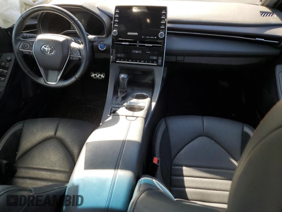 2021 Toyota Avalon Hybrid XSE z VIN 4T1EA1AB6MU007490, wystawiony jako Copart lot #75132224 z przebiegiem 61 669 mil mil oraz Nie do naprawy • Non repairable. Historia ofert i sprzedaży dostępna na DreamBid. Obrazek 8.