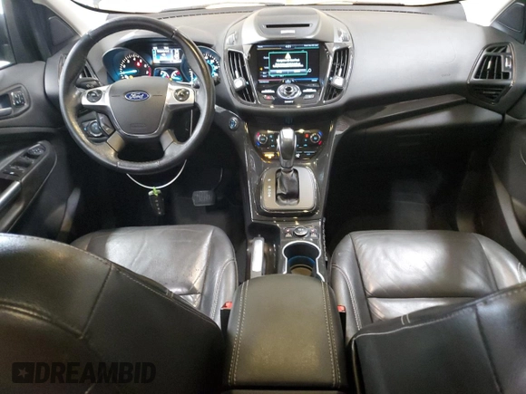 2015 Ford Escape Titanium with VIN 1FMCU9JX9FUA30970, listed as a Copart auction lot 41780275 with 106,114 mi miles and Salvage Title. Bid and sale history available at DreamBid. Image 8.