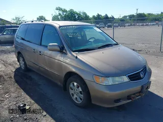 2003 Honda Odyssey EX z VIN 5FNRL18633B122838, wystawiony jako IAAI lot #42287776 z przebiegiem 130 544 mil mil oraz . Historia ofert i sprzedaży dostępna na DreamBid. Obrazek 1.