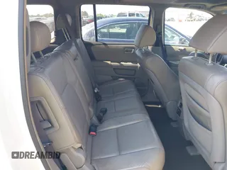 2009 Honda Pilot EX-L with VIN 5FNYF48619B022699, listed as a IAAI auction lot 42016173 with 204,190 mi miles and . Bid and sale history available at carsss.com. Image 8.