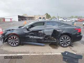 2016 Nissan Maxima SV z VIN 1N4AA6AP8GC408857, wystawiony jako IAAI lot #41892425 z przebiegiem 185 487 mil mil oraz . Historia ofert i sprzedaży dostępna na DreamBid. Obrazek 15.