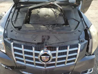 2013 Cadillac CTS Performance z VIN 1G6DK5E3XD0104466, wystawiony jako Copart lot #57479555 z przebiegiem Nie podano mil oraz Szkody całkowita. Historia ofert i sprzedaży dostępna na DreamBid. Obrazek 11.