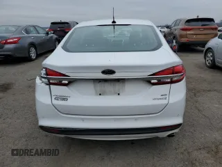 2018 Ford Fusion Hybrid SE with VIN 3FA6P0LU7JR234907, listed as a Copart auction lot 42498623 with 73,769 mi miles. Bid and sale history available at carsss.com. Image 6.