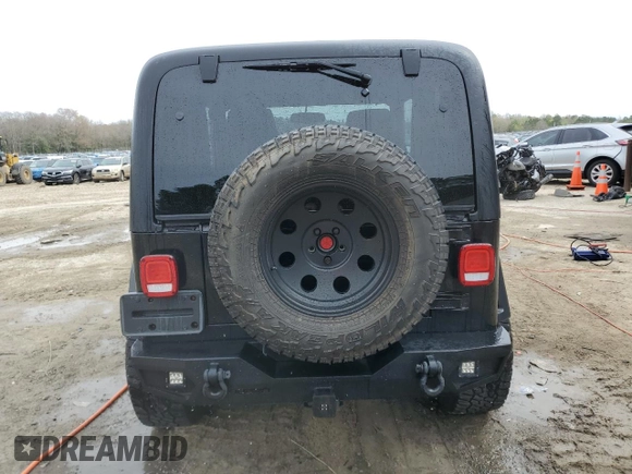 2004 Jeep Wrangler Sahara with VIN 1J4FA59SX4P722608, listed as a Copart auction lot 51223345 with 146,600 mi miles and Salvage title. Bid and sale history available at DreamBid. Image 6.
