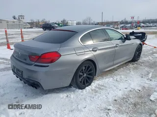 2013 BMW 6 Series 650i xDrive with VIN WBA6B4C54DDG67543, listed as a IAAI auction lot 41607681 with 74,101 mi miles. Bid and sale history available at carsss.com. Image 4.