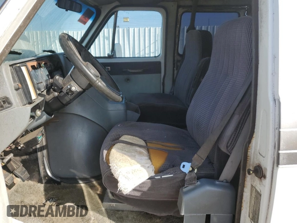 1990 Chevrolet Chevy Van z VIN 1GBEG25K0L7167885, wystawiony jako Copart lot #72575264 z przebiegiem 231 827 mil mil oraz Szkoda całkowita • Salvage title. Historia ofert i sprzedaży dostępna na DreamBid. Obrazek 7.