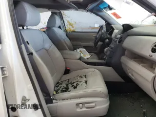 2014 Honda Pilot Touring z VIN 5FNYF4H99EB011079, wystawiony jako Copart lot #57869765 z przebiegiem Nie podano mil oraz Szkoda całkowita • Salvage title. Historia ofert i sprzedaży dostępna na DreamBid. Obrazek 7.