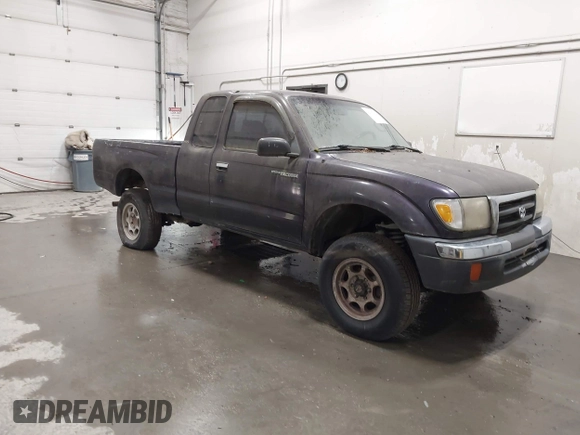 1999 Toyota Tacoma with VIN 4TAWM72N5XZ433296, listed as a IAAI auction lot 42595432 with 233,075 mi miles and . Bid and sale history available at DreamBid. Image 1.