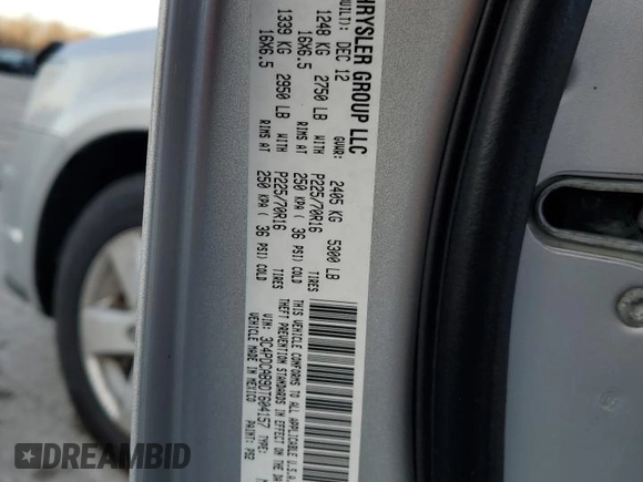 2013 Dodge Journey American Value with VIN 3C4PDCAB9DT604157, listed as a Copart auction lot 48206675 with 158,392 mi miles and Salvage Title. Bid and sale history available at DreamBid. Image 13.