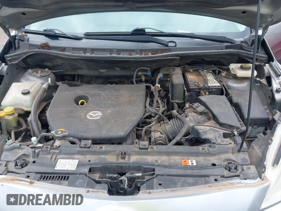 2012 Mazda 5 Sport with VIN JM1CW2BL0C0111151, listed as a IAAI auction lot 42359887 with 158,986 mi miles and . Bid and sale history available at DreamBid. Image 10.