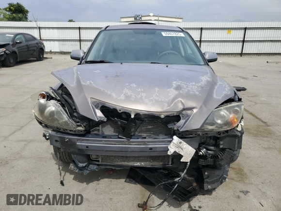 2007 Mazda 3 S Touring z VIN JM1BK344571662713, wystawiony jako Copart lot #59407825 z przebiegiem 107 723 mil mil oraz Szkoda całkowita • Salvage title. Historia ofert i sprzedaży dostępna na DreamBid. Obrazek 5.