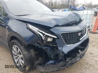2021 Cadillac XT4 AWD Sport with VIN 1GYFZFR45MF053573, listed as a IAAI auction lot 41909784 with 36,309 mi miles and . Bid and sale history available at DreamBid. Image 17.