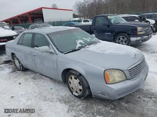 2005 Cadillac DeVille with VIN 1G6KD54Y65U258388, listed as a IAAI auction lot 41370249 with 124,497 mi miles. Bid and sale history available at carsss.com. Image 1.