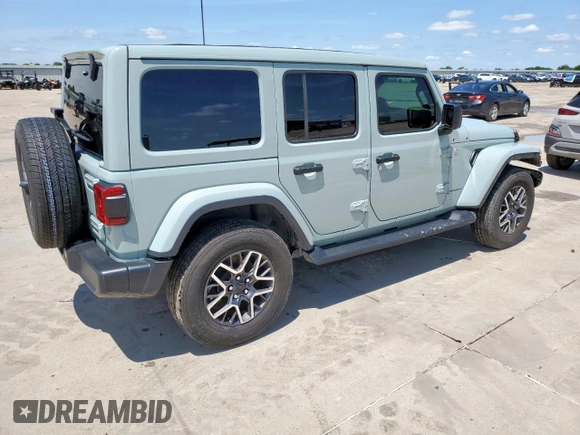 2024 Jeep Wrangler Sahara with VIN 1C4PJXEN6RW106911, listed as a Copart auction lot 58937945 with 13,948 mi miles and Salvage title. Bid and sale history available at DreamBid. Image 3.