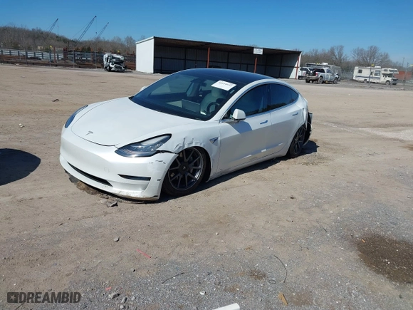 2020 Tesla Model 3 Standard Range Plus with VIN 5YJ3E1EA2LF718144, listed as a IAAI auction lot 41618932 with 61,772 mi miles. Bid and sale history available at carsss.com. Image 19.