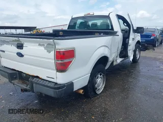 2014 Ford F-150 XL with VIN 1FTMF1CM1EKG31209, listed as a IAAI auction lot 42105573 with 187,162 mi miles and . Bid and sale history available at DreamBid. Image 4.