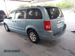 2009 Chrysler Town & Country Touring with VIN 2A8HR54119R584798, listed as a IAAI auction lot 42183484 with 174,871 mi miles and . Bid and sale history available at DreamBid. Image 3.
