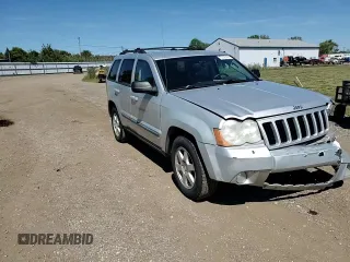 2009 Jeep Grand Cherokee Laredo with VIN 1J8HR48P29C537653, listed as a Copart auction lot 70190404 with 192,796 mi miles and Salvage Title. Bid and sale history available at carsss.com. Image 11.
