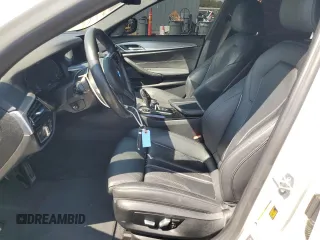 2020 BMW 5 Series 530e with VIN WBAJA9C03LCD28842, listed as a Copart auction lot 69901984 with 63,036 mi miles and Salvage Title. Bid and sale history available at DreamBid. Image 7.