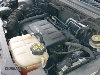 2015 Chevrolet Trax LS z VIN KL7CJKSB6FB247070, wystawiony jako IAAI lot #42735383 z przebiegiem 141 791 mil mil oraz . Historia ofert i sprzedaży dostępna na DreamBid. Obrazek 18.