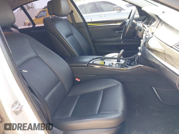 2013 BMW 5 Series 528i with VIN WBAXG5C57DD229608, listed as a IAAI auction lot 41999493 with 147,003 mi miles and . Bid and sale history available at carsss.com. Image 5.
