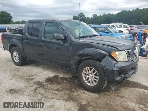 2014 Nissan Frontier SV with VIN 1N6AD0ER0EN752689, listed as a Copart auction lot 61482715 with 159,953 mi miles and Salvage title. Bid and sale history available at DreamBid. Image 4.