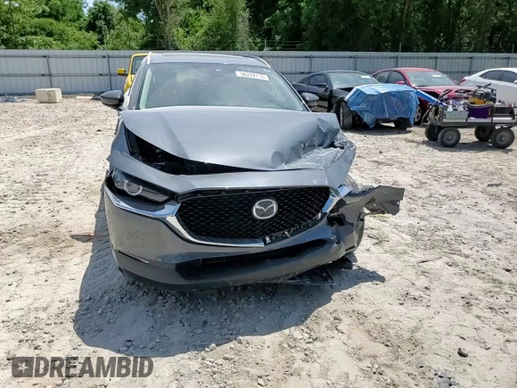 2022 Mazda CX-30 S Carbon Edition с VIN 3MVDMBCL0NM434395, выставлен на аукционе Copart как лот 56247715 с пробегом 40 698 миль миль и На запчасти • Non repairable. История ставок и продаж доступна на DreamBid. Изображение 14.