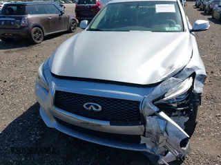 2015 Infiniti Q50 with VIN JN1BV7AR3FM416371, listed as a IAAI auction lot 42036139 with 76,239 mi miles and . Bid and sale history available at DreamBid. Image 12.