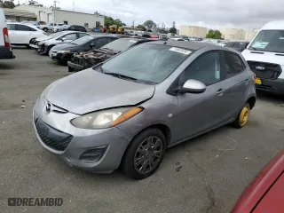 2012 Mazda Mazda2 Sport with VIN JM1DE1KZ2C0147560, listed as a Copart auction lot 71663534 with 168,798 mi miles and Salvage Title. Bid and sale history available at carsss.com. Image 1.