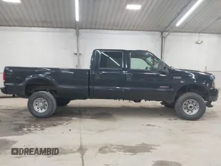 2004 Ford F-350 XL z VIN 1FTSW31P74EB44030, wystawiony jako IAAI lot #42232329 z przebiegiem 141 796 mil mil oraz . Historia ofert i sprzedaży dostępna na DreamBid. Obrazek 13.