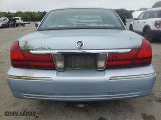 2003 Mercury Grand Marquis GS Convenience with VIN 2MEFM74W63X704603, listed as a Copart auction lot 72118014 with 128,599 mi miles and Clean Title. Bid and sale history available at carsss.com. Image 6.