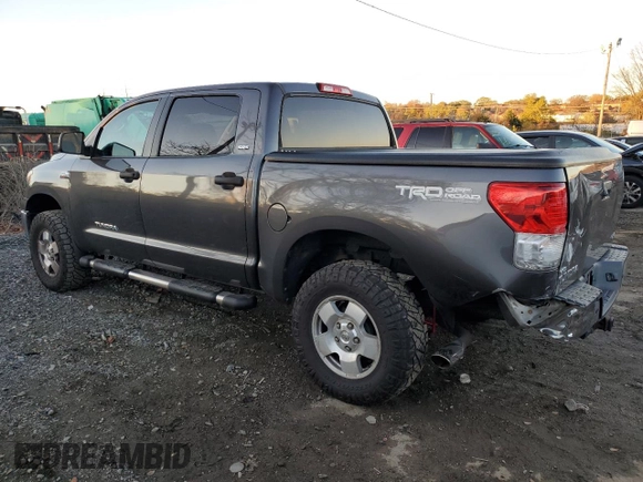 2011 Toyota Tundra 4WD Truck with VIN 5TFDY5F12BX205210, listed as a Copart auction lot 79915794 with 214,543 mi miles and Salvage Title. Bid and sale history available at carsss.com. Image 2.