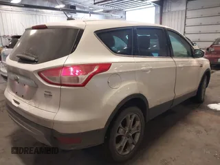 2013 Ford Escape SEL with VIN 1FMCU9HX0DUD85206, listed as a IAAI auction lot 41623110 with 99,223 mi miles. Bid and sale history available at carsss.com. Image 4.