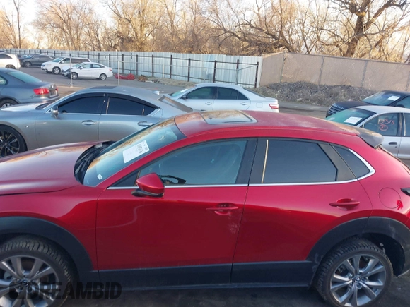 2022 Mazda CX-30 S Carbon Edition с VIN 3MVDMBCL4NM431242, выставлен на аукционе IAAI как лот 41851636 с пробегом 40 982 миль миль и . История ставок и продаж доступна на DreamBid. Изображение 14.
