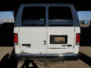 2013 Ford Econoline Passenger XL with VIN 1FBSS3BL0DDA77076, listed as a Copart auction lot 70474004 with 154,679 mi miles and Salvage Title. Bid and sale history available at carsss.com. Image 6.