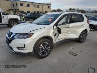 2017 Nissan Rogue SL z VIN 5N1AT2MT0HC825974, wystawiony jako Copart lot #83856374 z przebiegiem Nie podano mil oraz Szkoda całkowita • Salvage title. Historia ofert i sprzedaży dostępna na DreamBid. Obrazek 1.
