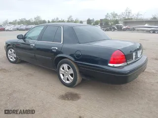 2011 Ford Crown Victoria LX with VIN 2FABP7EV0BX147267, listed as a IAAI auction lot 42052728 with 177,034 mi miles. Bid and sale history available at carsss.com. Image 3.