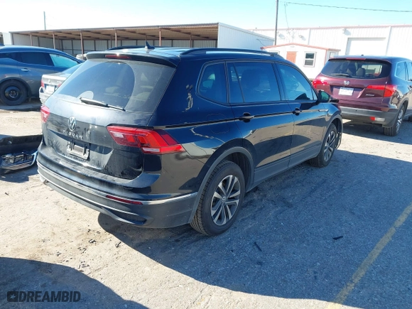 2022 Volkswagen Tiguan S with VIN 3VV1B7AX7NM107779, listed as a IAAI auction lot 41210258 with 57,154 mi miles. Bid and sale history available at carsss.com. Image 4.