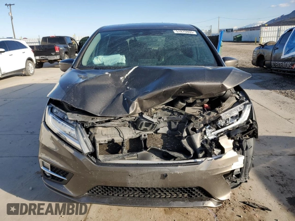 2018 Honda Odyssey Touring с VIN 5FNRL6H8XJB076145, выставлен на аукционе Copart как лот 51870865 с пробегом 96 486 миль миль и Списание • Salvage title. История ставок и продаж доступна на DreamBid. Изображение 5.